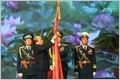 全民国防日30周年和越南人民军建军75周年纪念典礼暨一级军功勋章授勋仪式隆重举行