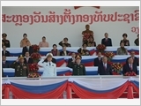 Đại tướng Ngô Xuân Lịch dự Lễ kỷ niệm 70 năm Ngày thành lập Quân đội nhân dân Lào tại Vientiane