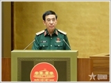 Đại tướng Phan Văn Giang trình bày Tờ trình về sửa đổi, bổ sung 11 luật về lĩnh vực quân sự, quốc phòng